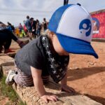 photo of a baby wearing a hat with the Bright Futures logo