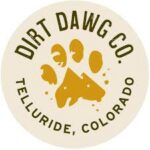 Dirt Dawg Co logo featuring yellow paw prints and dog silhouette with circular text reading “Dirt Dawg Co Telluride, Colorado” on a beige background.